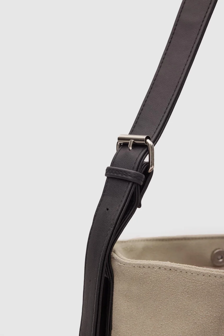 faux suede shoulder bag in cream