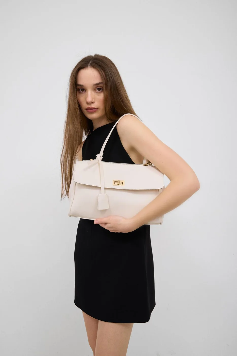 Faux leather shoulder bag in cream