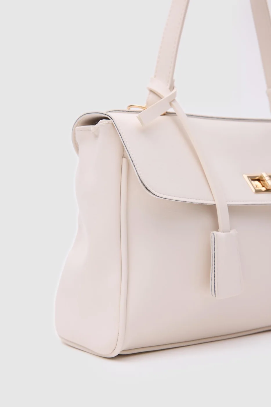 Faux leather shoulder bag in cream