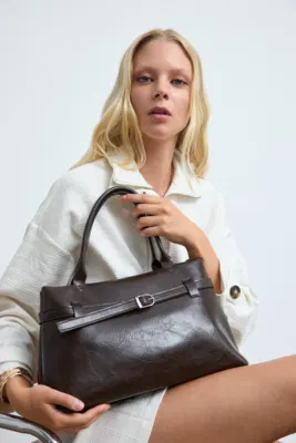 Faux leather shoulder bag in dark brown