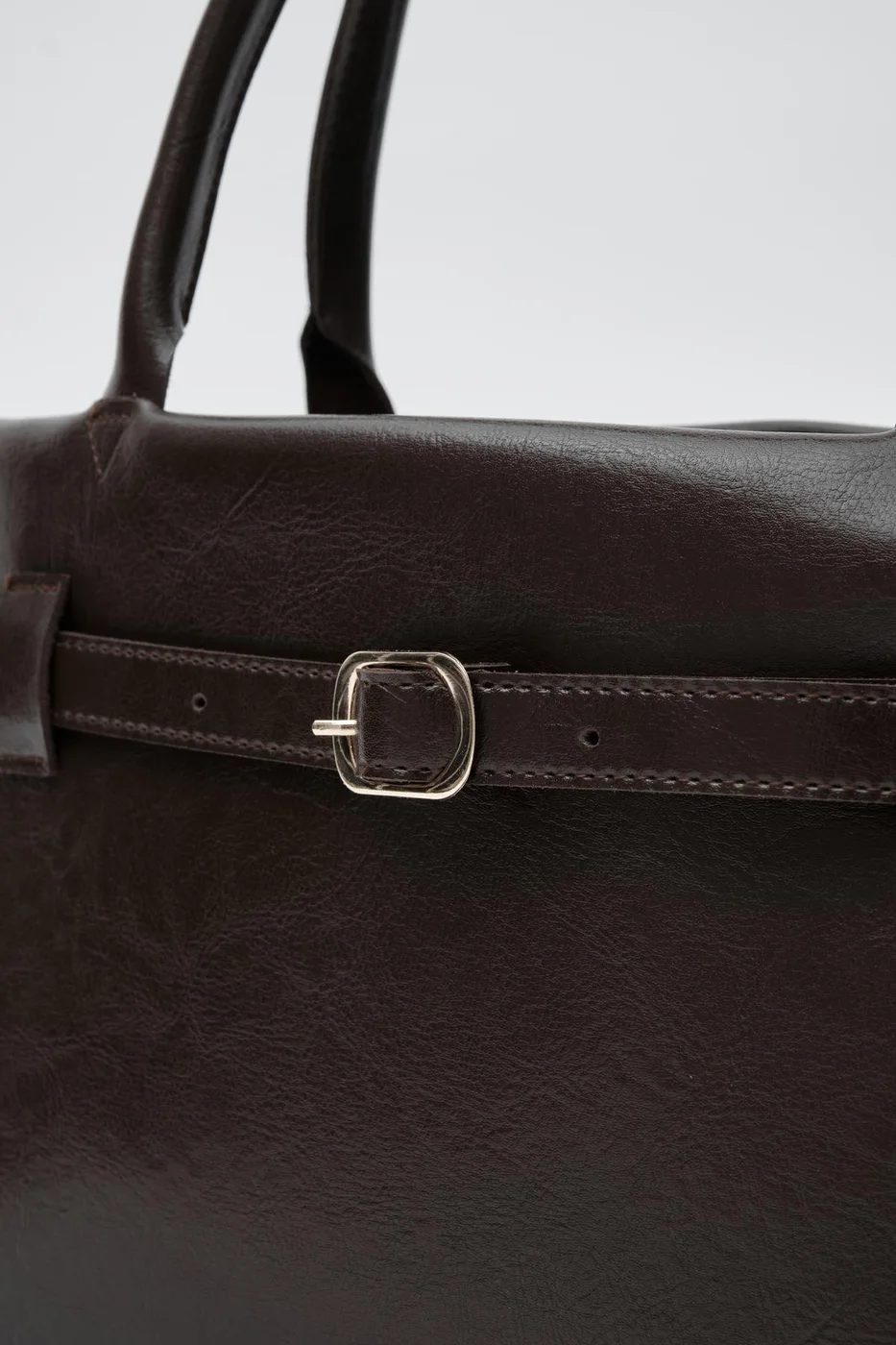 Faux leather shoulder bag in dark brown
