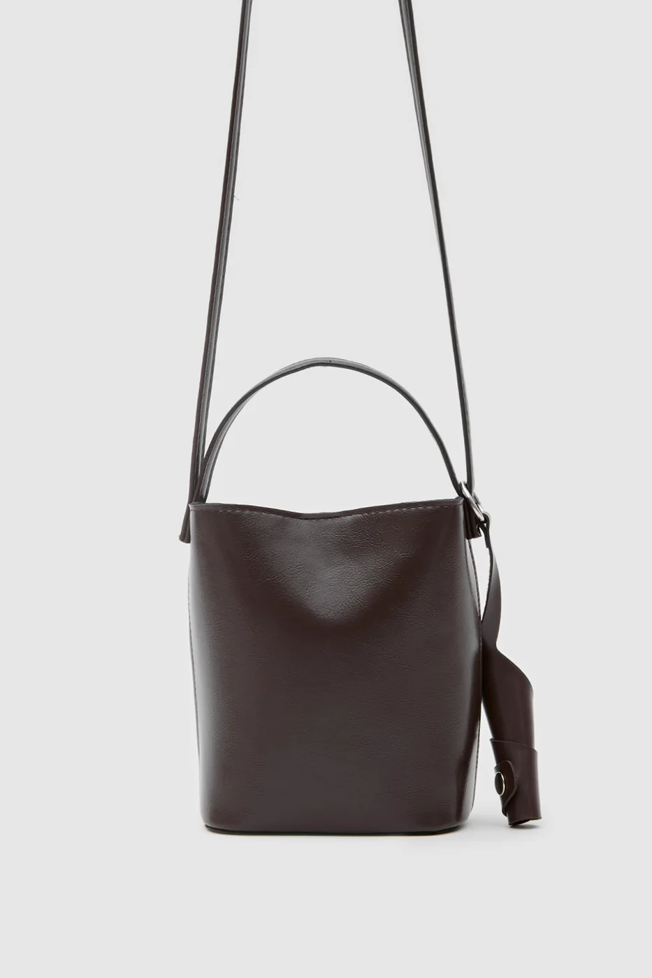 Faux leather crossbody bag Faux leather crossbody bag in dark brown