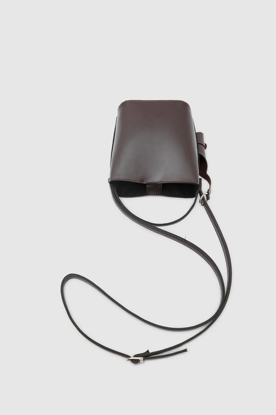 Faux leather crossbody bag Faux leather crossbody bag in dark brown