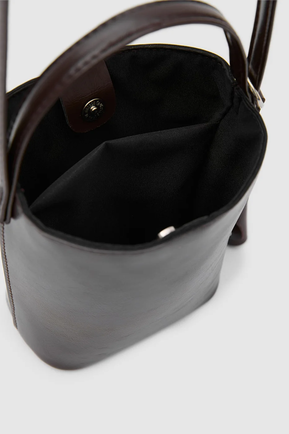 Faux leather crossbody bag Faux leather crossbody bag in dark brown