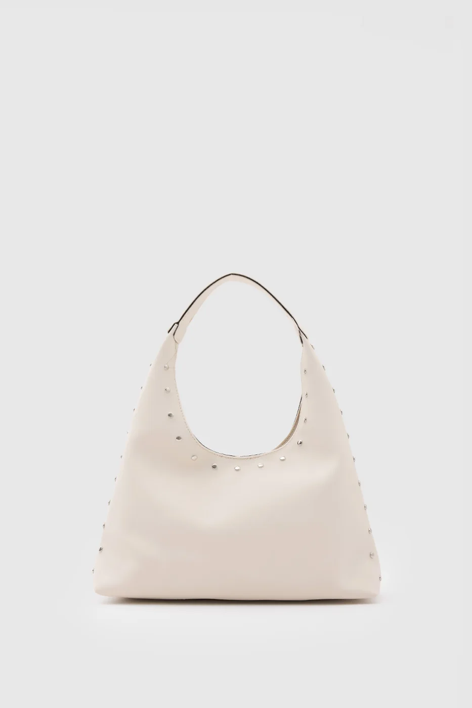 Faux leather shoulder bag with stylish design in cream