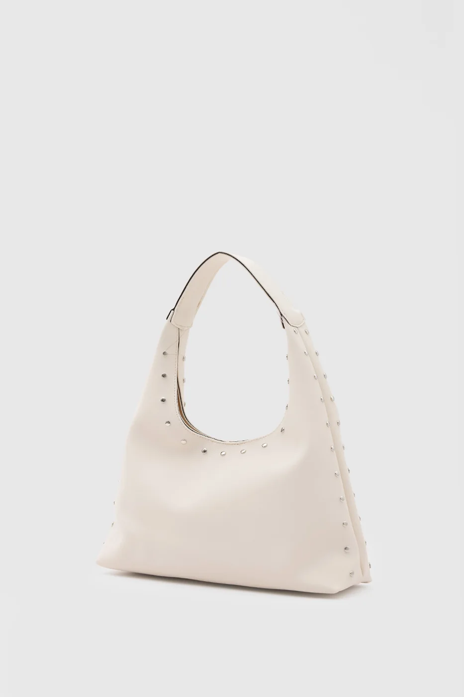 Faux leather shoulder bag with stylish design in cream