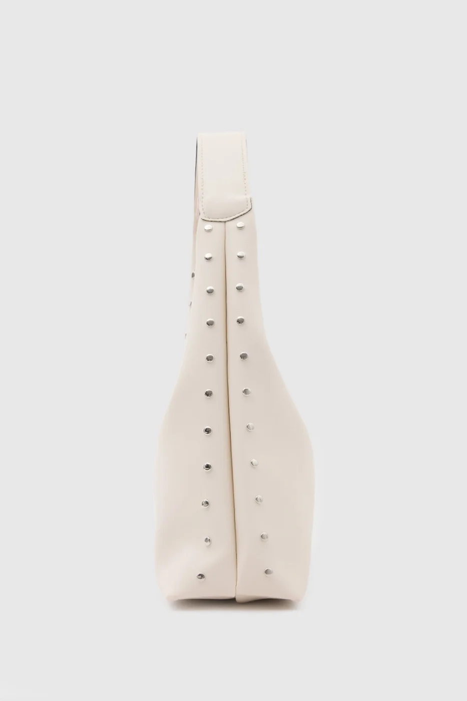 Faux leather shoulder bag with stylish design in cream