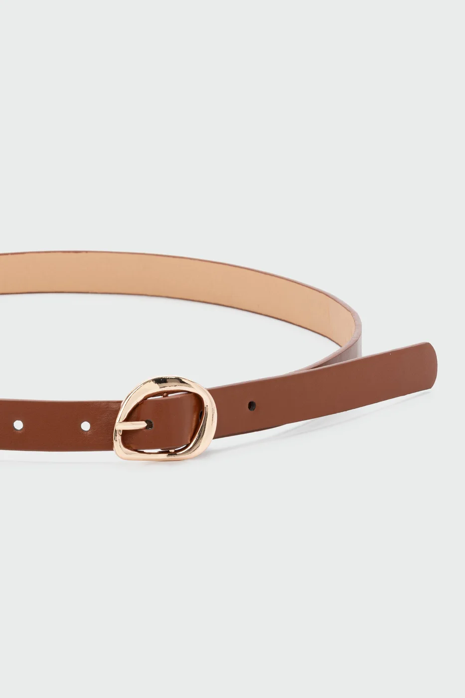 Faux leather belt with asymmetrical buckle Faux leather belt with asymmetrical buckle in tan