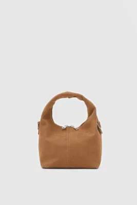 faux suede crossbody bag in tan