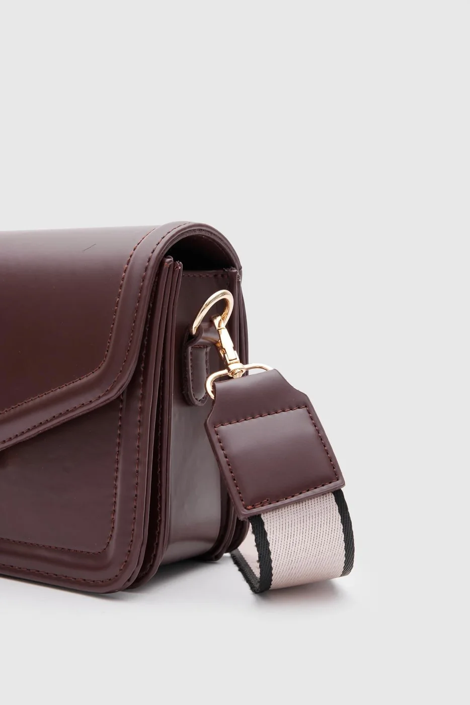 Faux leather crossbody bag Faux leather crossbody bag in dark brown