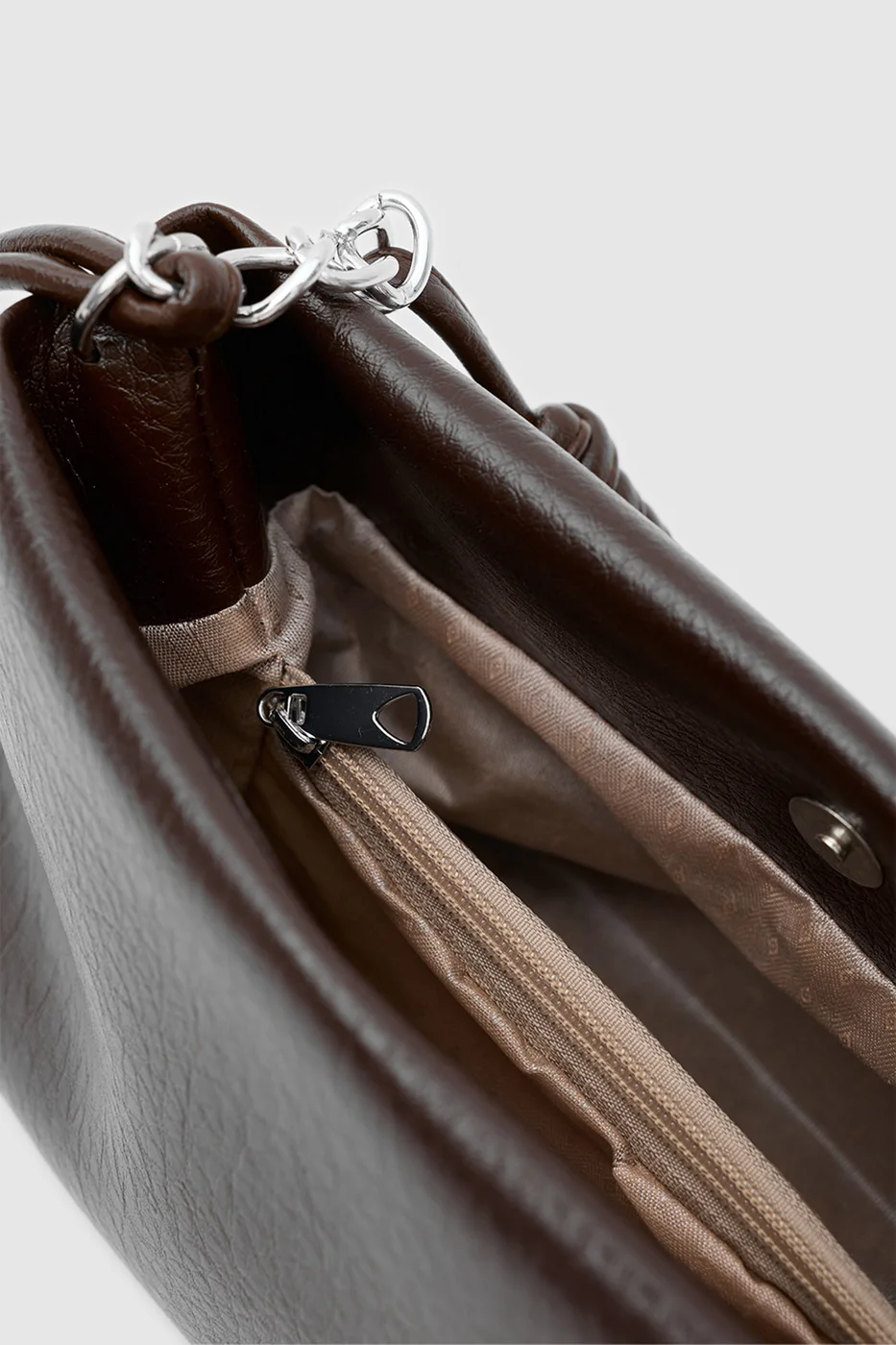 Faux leather crossbody bag with chain detail in brown