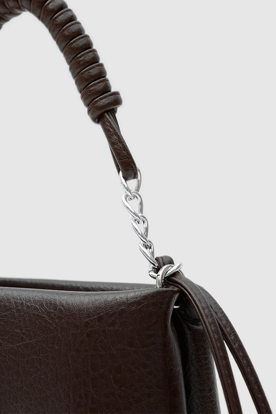 Faux leather crossbody bag with chain detail in brown