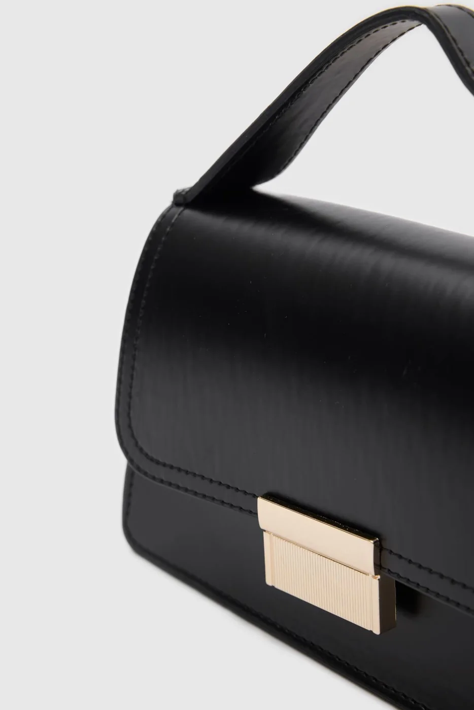 faux leather crossbody bag in black