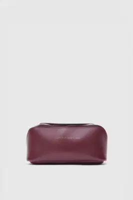 Faux leather cosmetic bag in burgundy
