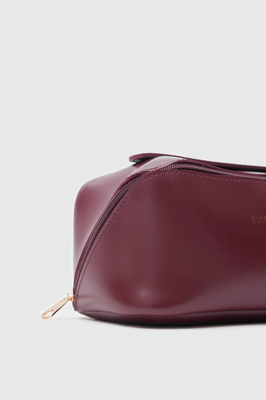 Faux leather cosmetic bag in burgundy