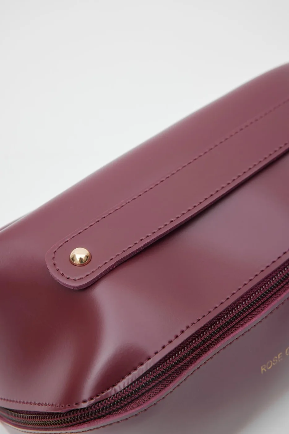 Faux leather cosmetic bag in burgundy