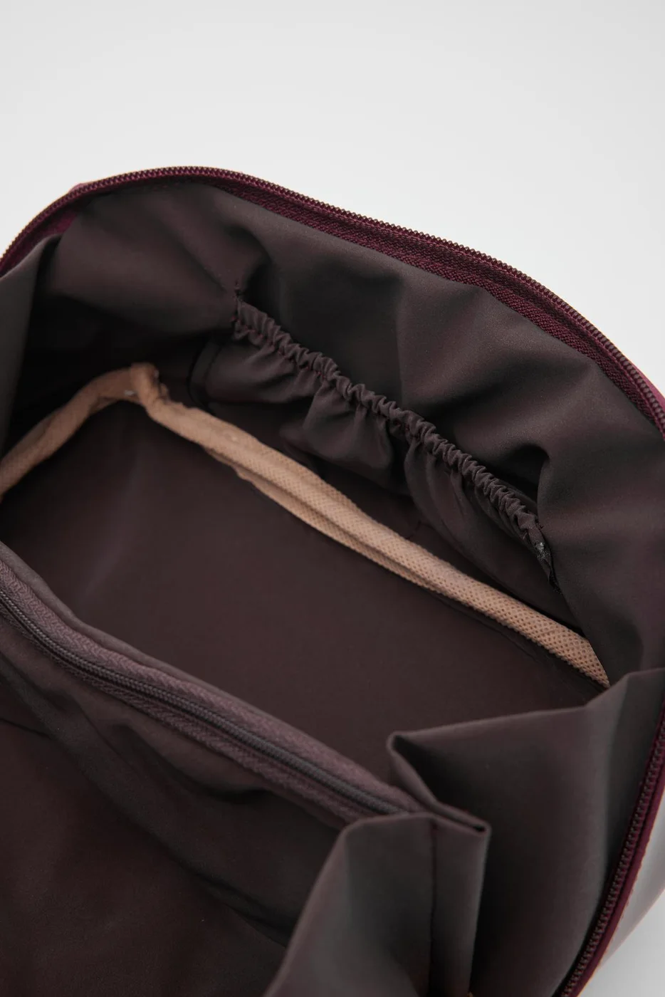 Faux leather cosmetic bag in burgundy
