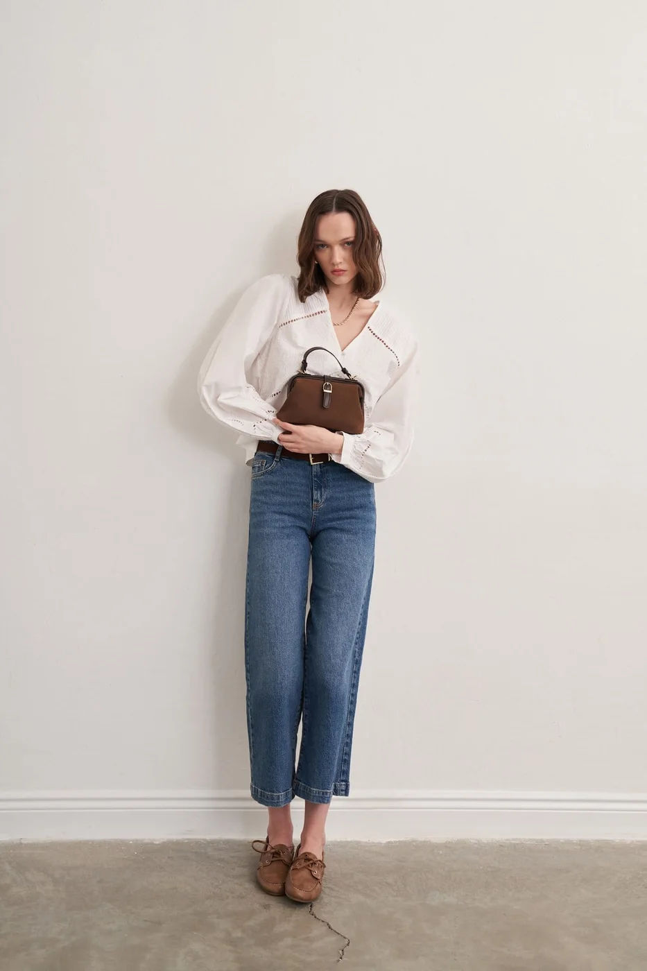 faux suede crossbody bag in dark brown
