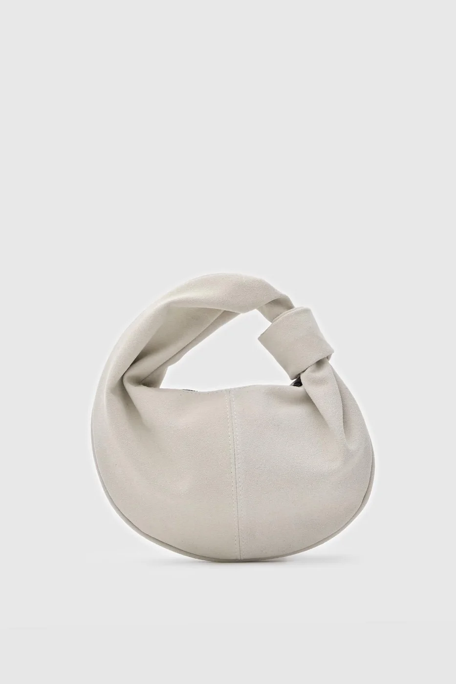 faux suede baguette bag in stone