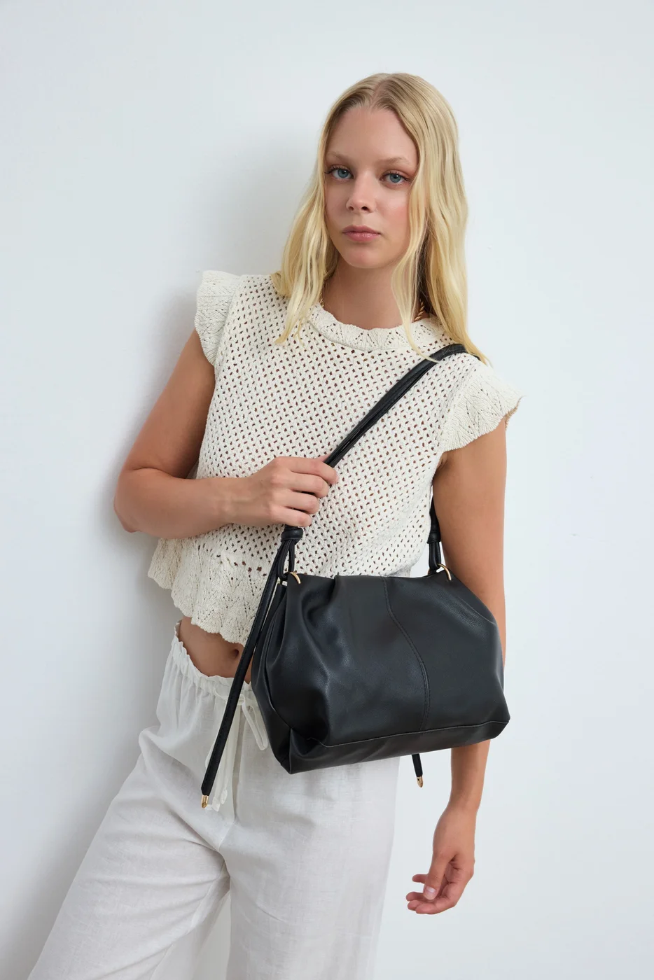 Faux leather shoulder bag in black