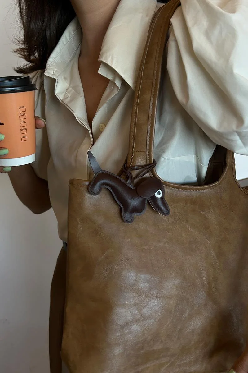 faux leather shoulder bag in taupe