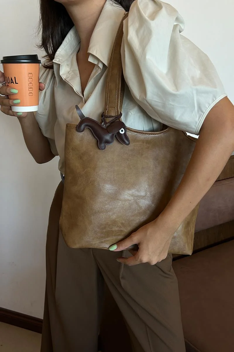faux leather shoulder bag in taupe
