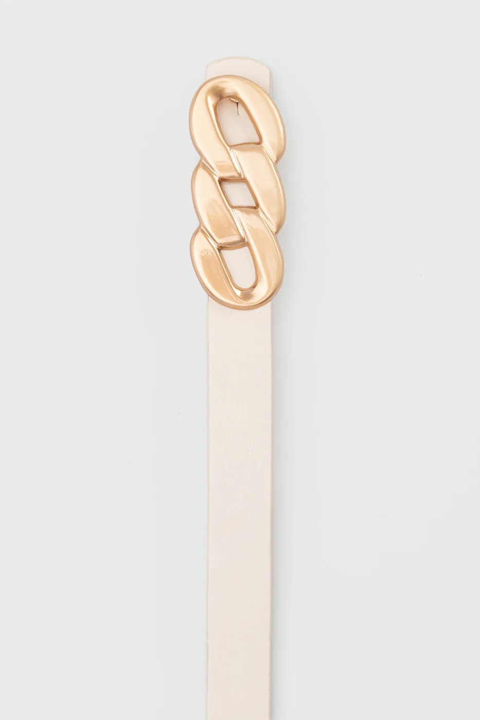 Faux leather skinny belt with chain look Faux leather skinny belt with chain look in cream