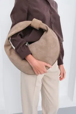 faux suede shoulder bag in taupe