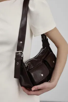 Faux leather shoulder bag in brown