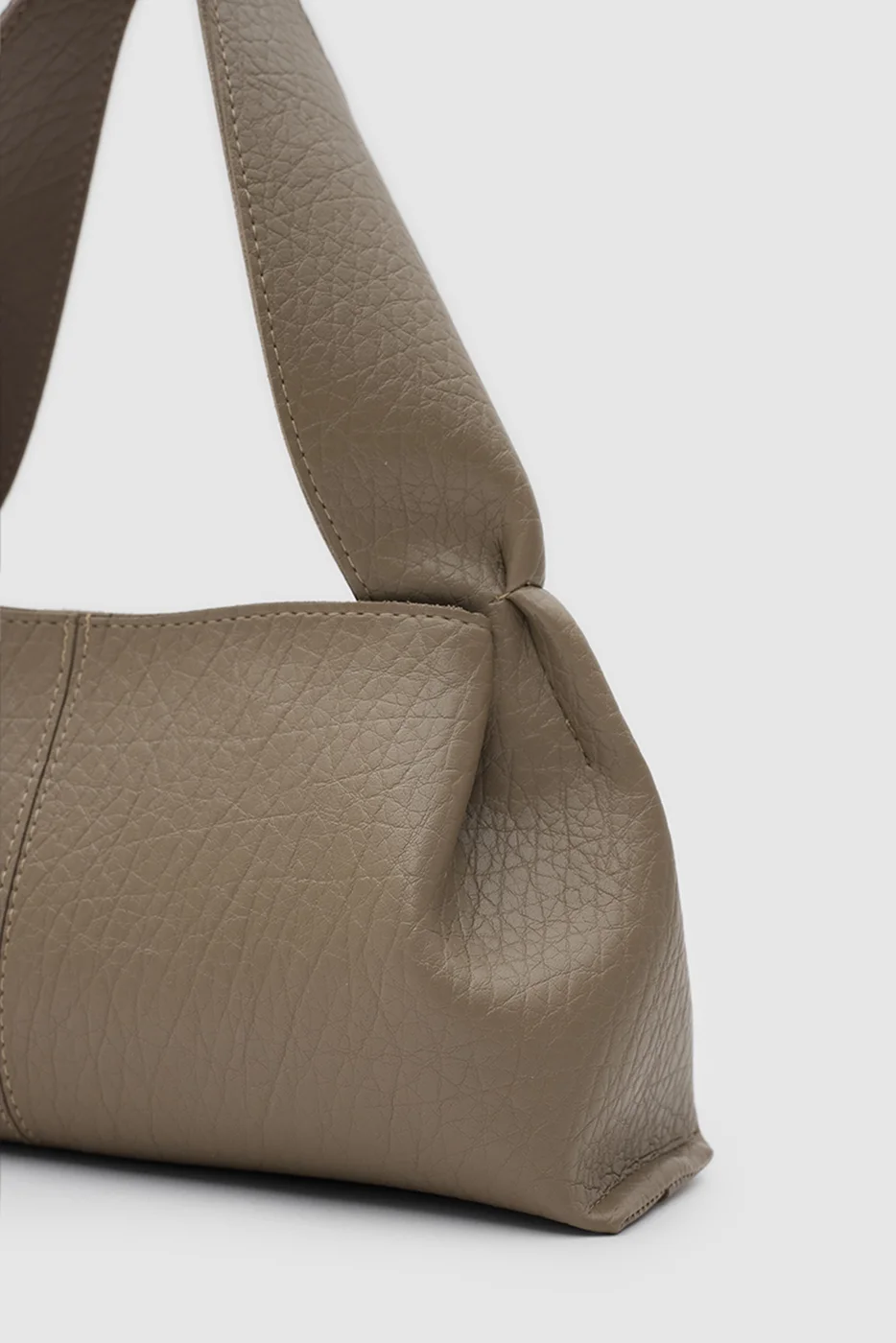 Faux leather shoulder bag for stylish daily use in taupe