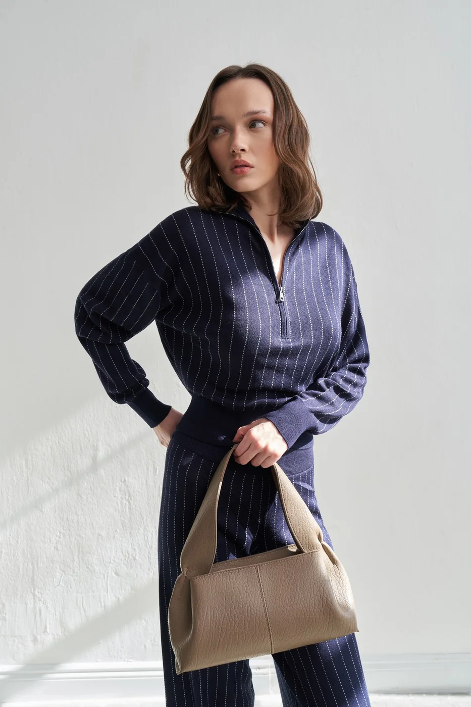 Faux leather shoulder bag for stylish daily use in taupe