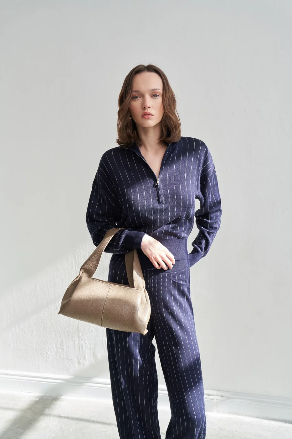 Faux leather shoulder bag for stylish daily use in taupe