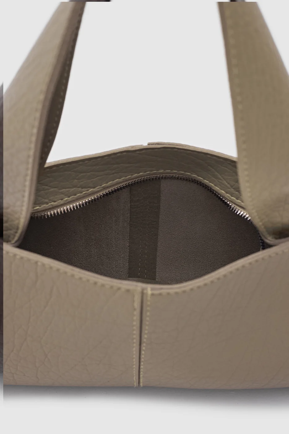Faux leather shoulder bag for stylish daily use in taupe