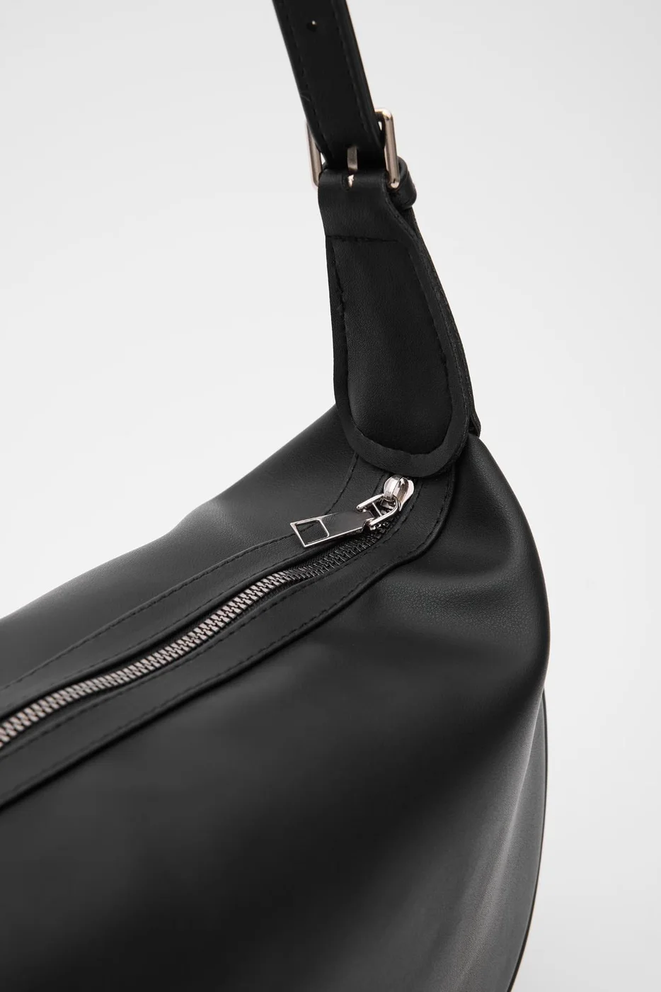 Faux leather shoulder bag in black