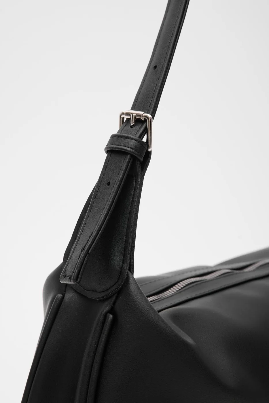 Faux leather shoulder bag in black
