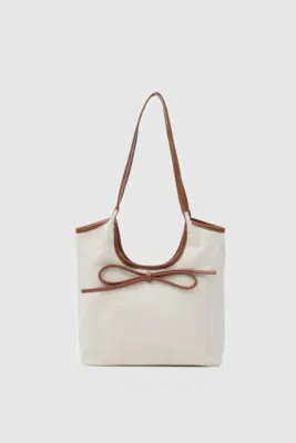Canvas shoulder bag with bow detail in tan