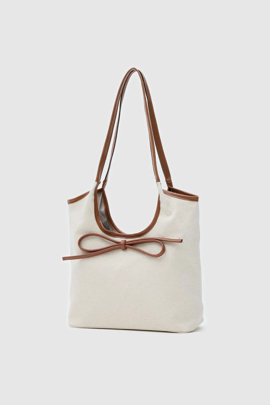 Canvas shoulder bag with bow detail Canvas shoulder bag with bow detail in tan
