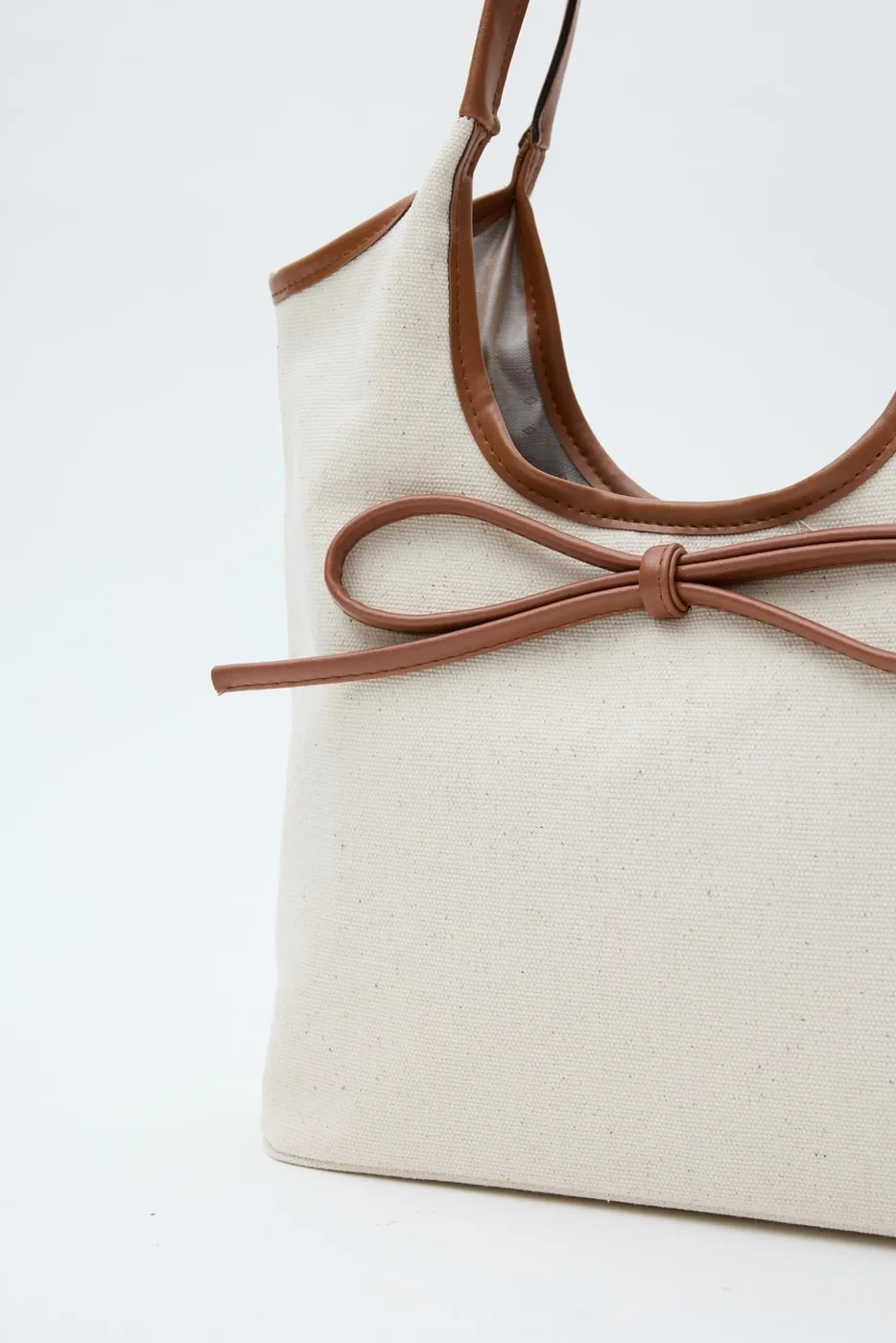 Canvas shoulder bag with bow detail Canvas shoulder bag with bow detail in tan