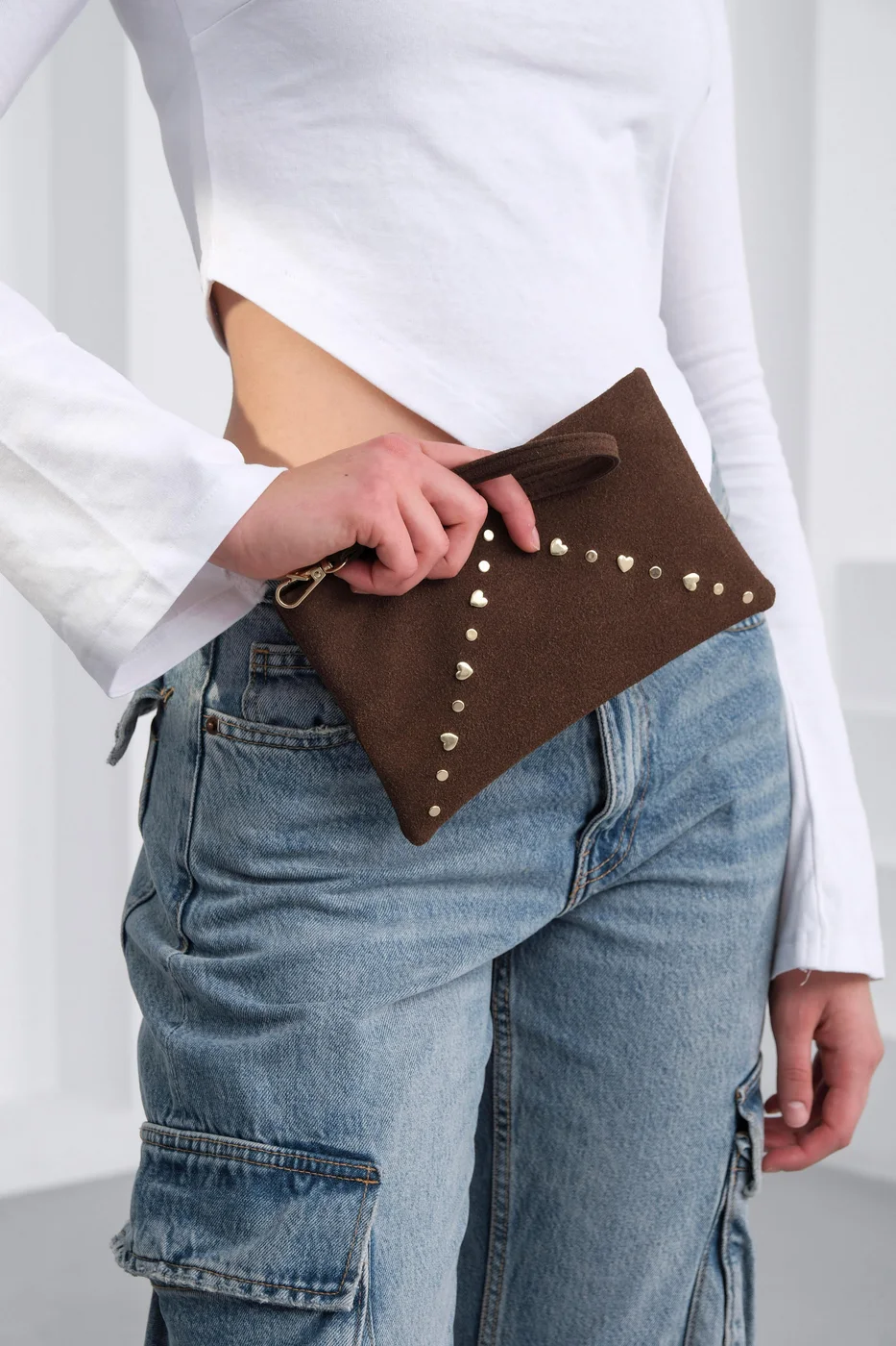 Faux leather clutch bag in brown