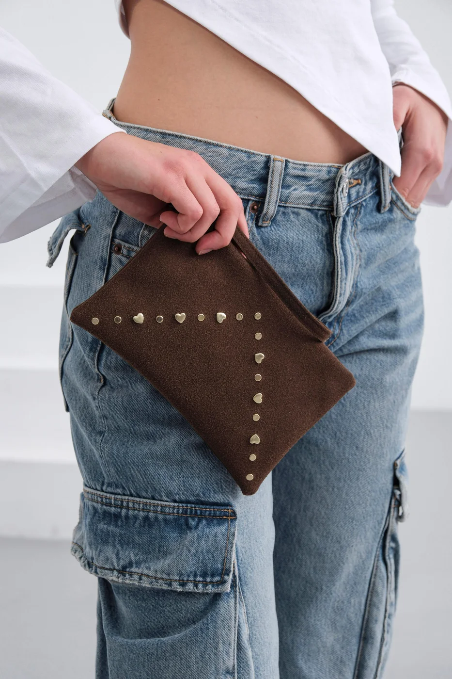 Faux leather clutch bag in brown
