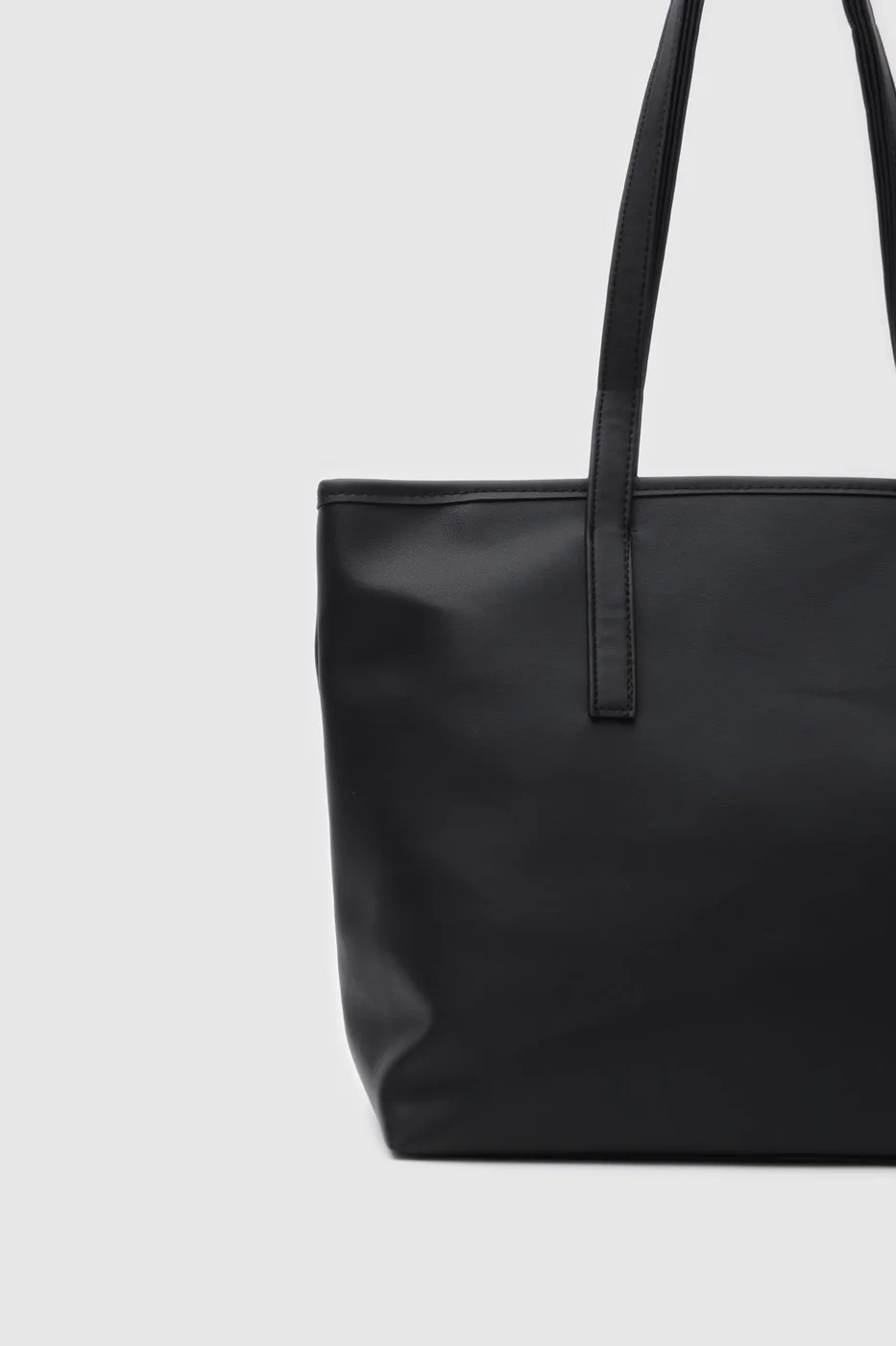 Faux leather shoulder bag for daily use in black