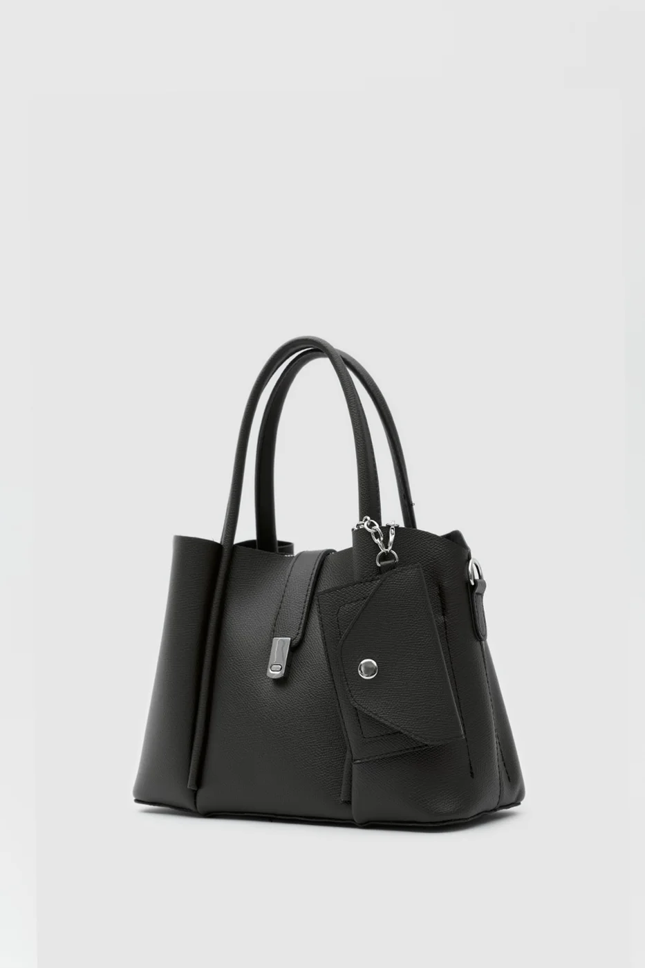 Faux leather shoulder bag with charm in black