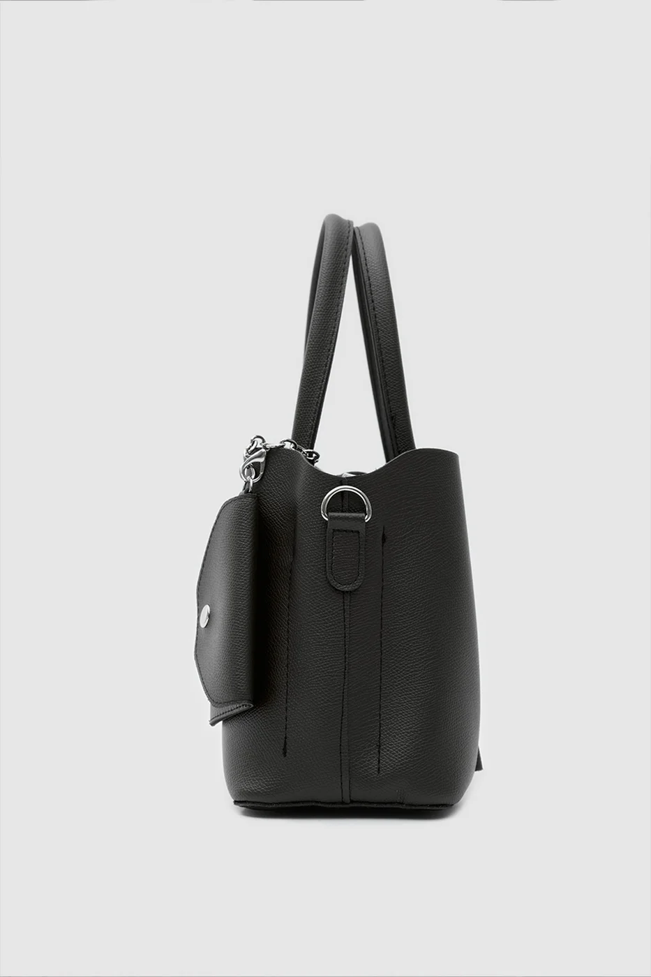 Faux leather shoulder bag with charm in black