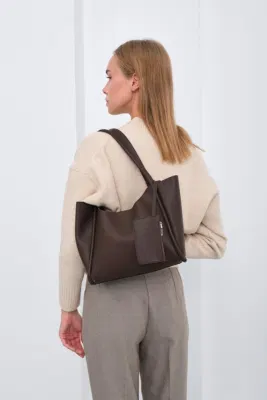 Faux leather shoulder bag in dark brown
