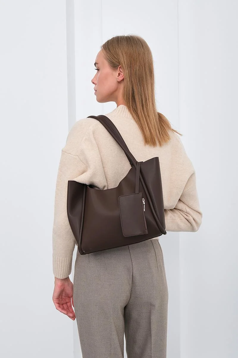 Faux leather shoulder bag in dark brown