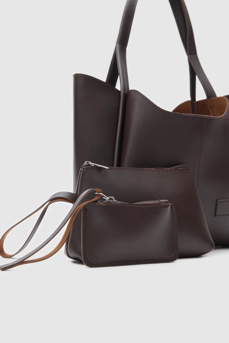 Faux leather shoulder bag in dark brown