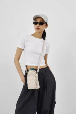 technical fabric crossbody bag in cream