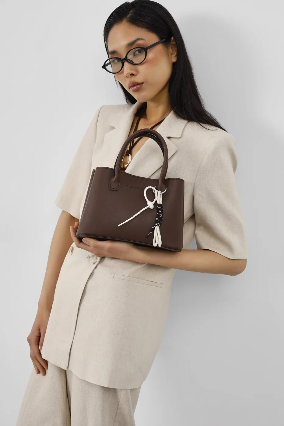 faux leather crossbody bag in dark brown