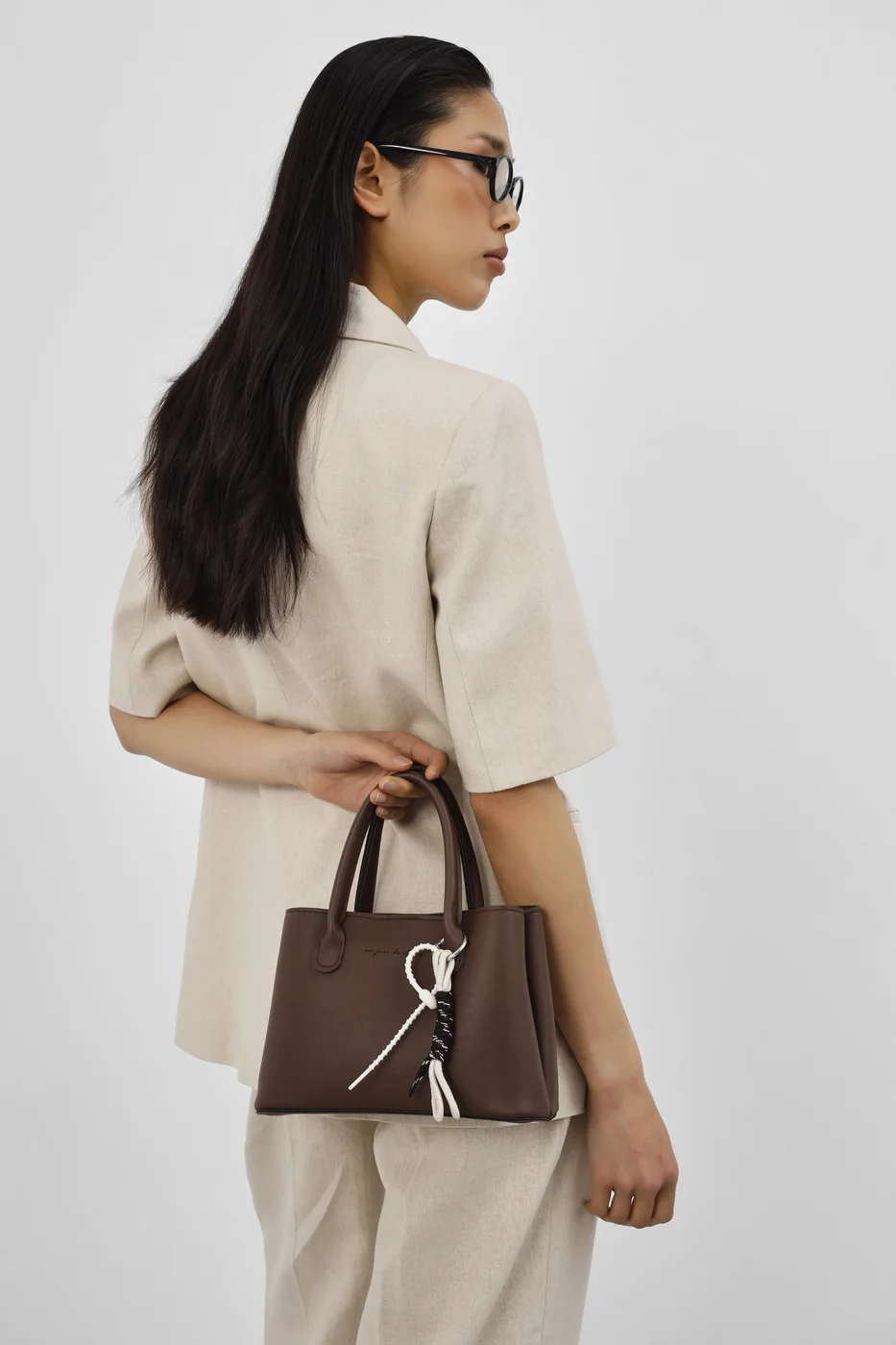 faux leather crossbody bag in dark brown