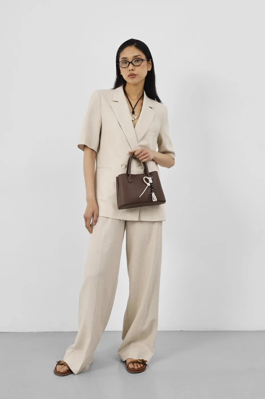 faux leather crossbody bag in dark brown